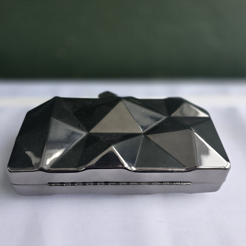 Elegant Silvertone Geometric Clutch Discontinued